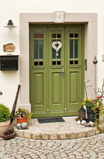 Haustür aus Kiefer, 2- flügelig, Sprossenverglasung mit Echtantik und Eisblumenglas