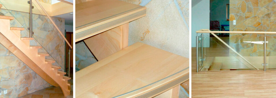 Treppe aus Ahorn, Geländer Edelstahl - Glas mit Holzhandlauf, Trittstufen mit Trittstopp und Stufenkante mit Metallstreifeneinlage